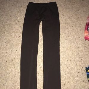 Leggings that are dark brown and very thick